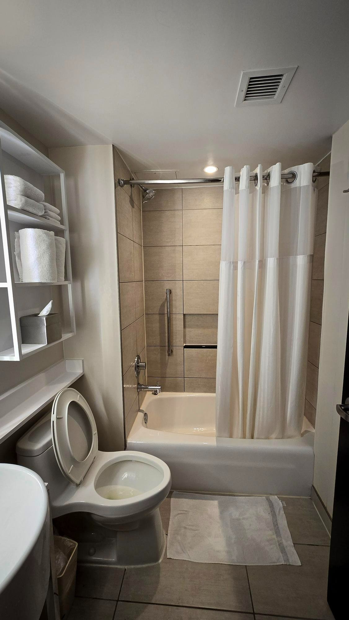 Bathroom plumbing area before renovation work